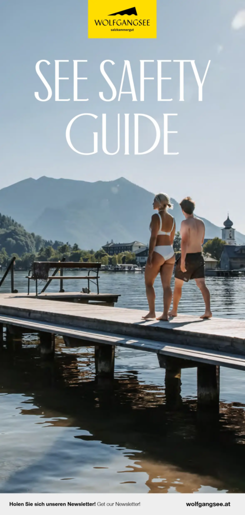 See Safety Guide Wolfgangsee Bild des Wolfgangsees mit Päarchen das über einen Steg läuft und im Bild steht "See Safety Guide"